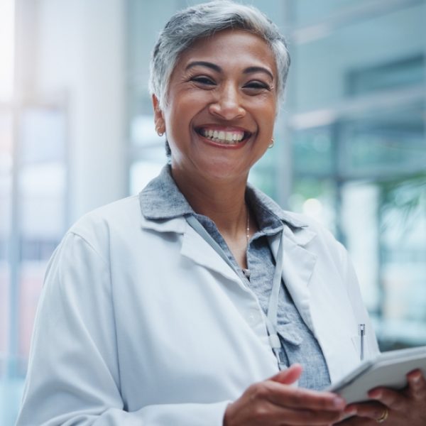 Female,Doctor,,Portrait,And,Smile,With,Tablet,In,Hospital,Or Female,Doctor,,Portrait,And,Smile,With,Tablet,In,Hospital,Or